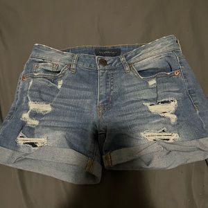 Blue ripped jean shorts